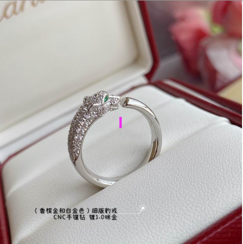 CARTIER PANTHERE RING W/ EMERALD EYES