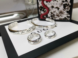 GUCCI SILVER BLIND FOR LOVE RINGS AND BRACELETS